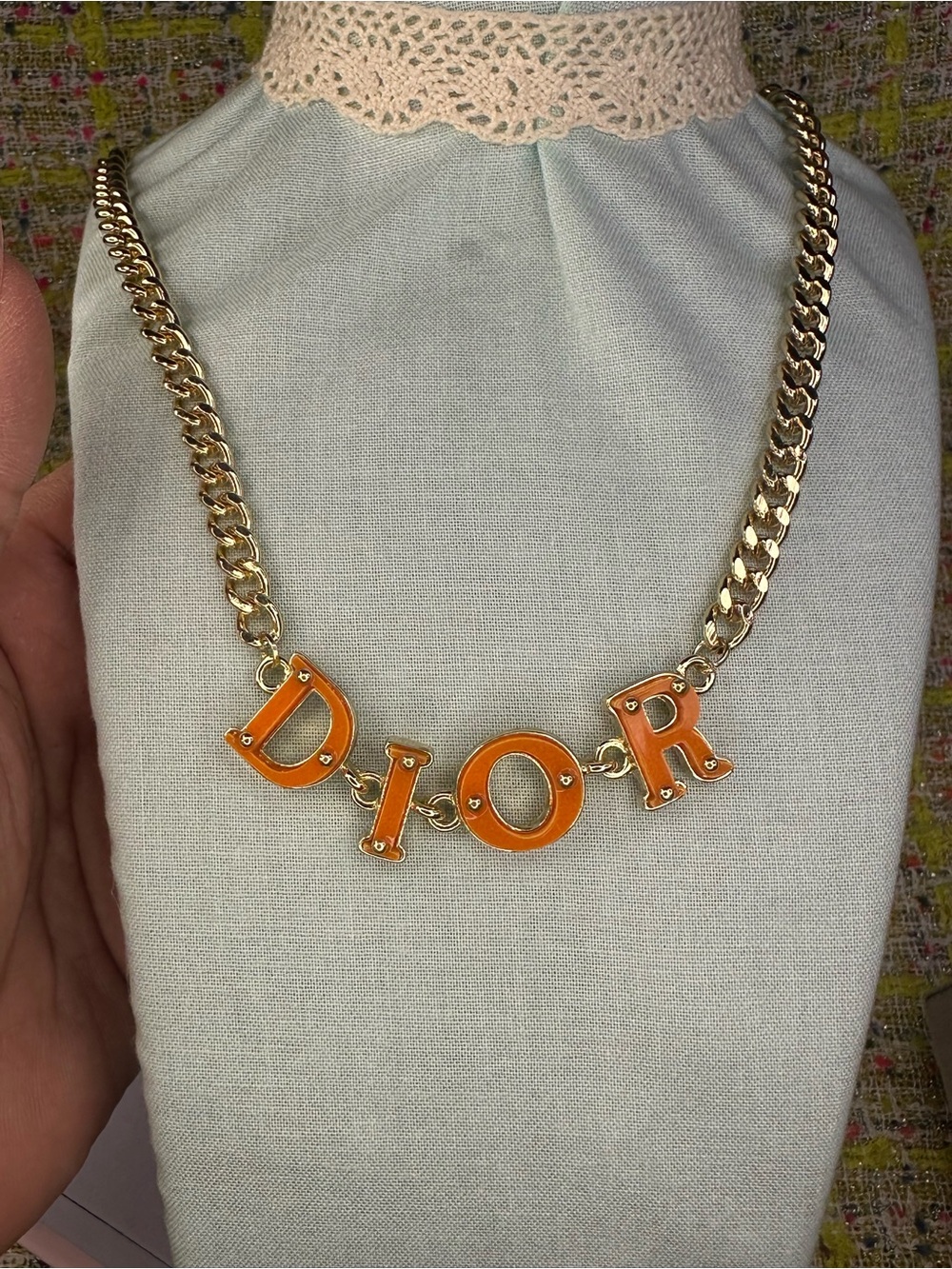 A great Gold-Tone Necklace with Orange Letter Pendants